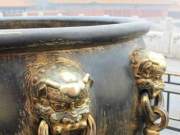 gilded vats showing their scratches